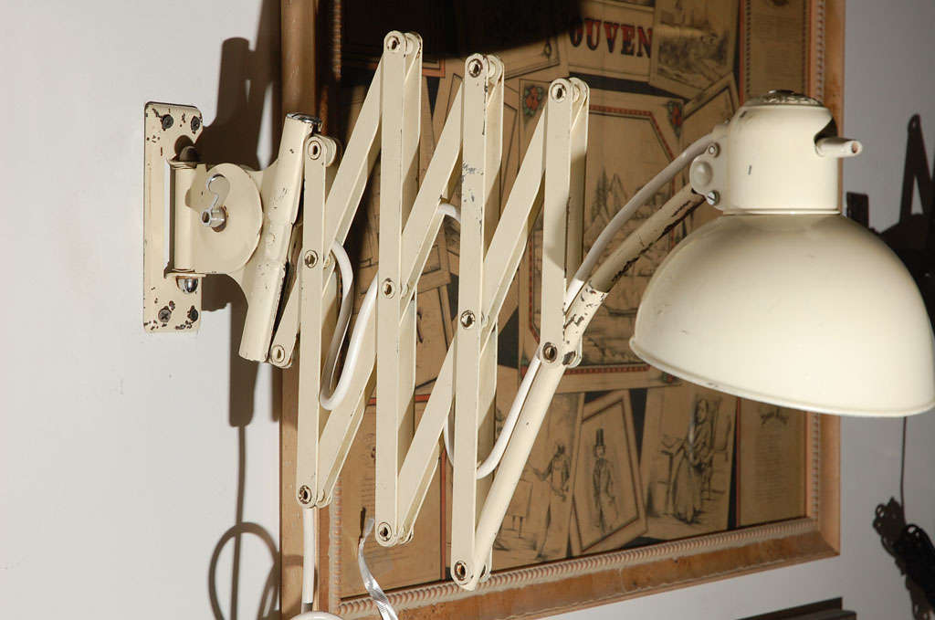 cream colored accordion wall light