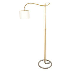 A Boris Lacroix Brass and Steel Adjustable Standing Lamp.