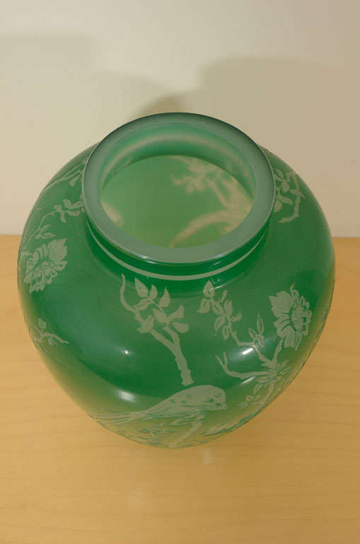 Steuben Acid-cutback green jade bird glass vase, cased glass, catalog No. 5000,(bird) Raised rim on ovoid form in green jade cut to alabaster in bird design, 9 1/2