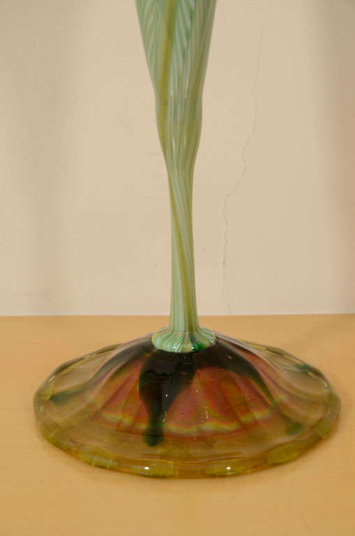 Imposing and important tall tiffany studios, tiffany favrile glass Calyx decorated vase with fantastic strong iridiscence. Signed L.C.T. 1485, circa 1898 - 1900 The flower is depicted with closed petals, prior to blossoming. Measuring 17