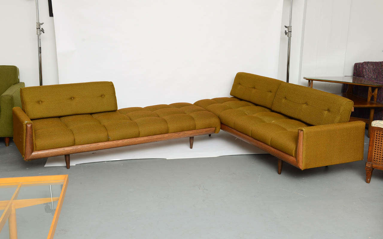 Rare Adrian Pearsall sectional couch with walnut trim and legs.  This is an amazing conversation piece for any lover of MCM furniture.  The wood is in wonderful shape, though the couch should be reupholstered.  Couch is circa 1960.