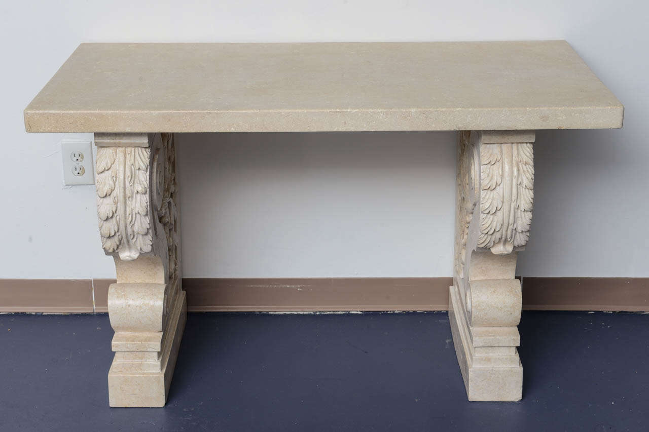 Pair of stone consoles, a thick stone (calcareous) top supported by stone carved pedestals (Pompeian style) the external side of each basement is carved in a vegetal inspiration.
Perfect for inside or outside garden furniture’s as well, terrace or