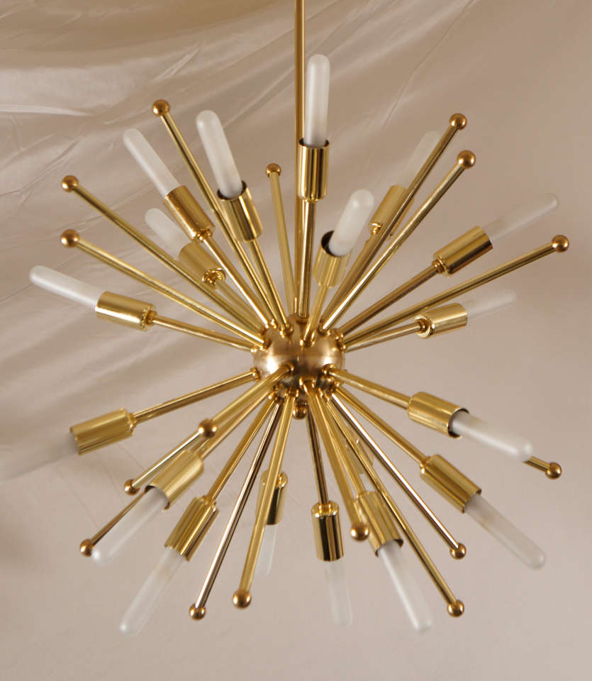 This chandelier is executed in brass.
Can be converted to chandelier. 
The entire collection of licensed Lou Blass sculptures and lighting editions are available in the US exclusively through Ad Lib Antiques & Interiors, NY
Matching wall lights