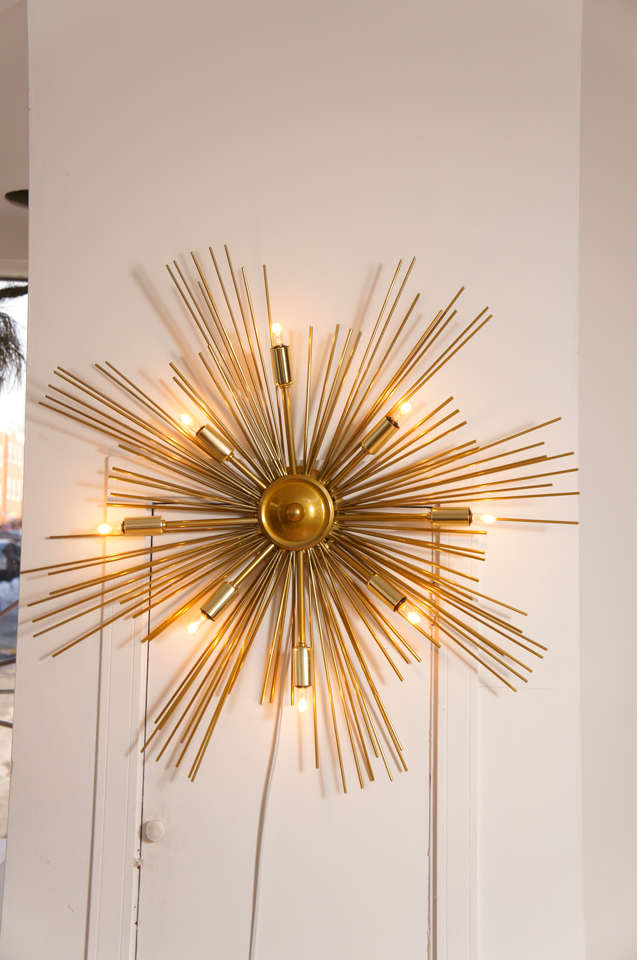 Sconce or ceiling fixture, flush mounted, executed in buttered brass powder-coated finish. Available in many colors, and finishes.

The entire collection of licensed Lou Blass sculptures and lighting editions are available in the US exclusively
