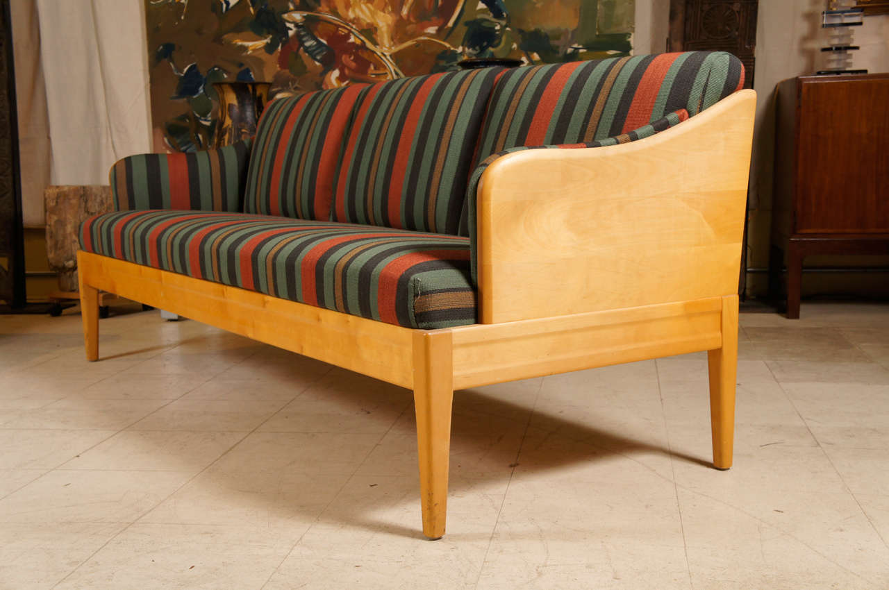 Sofa bench in birchwood from Sweden by designer Carl Malmsten covered in a striped wool fabric neoclassical country style. Circa 1940s.
