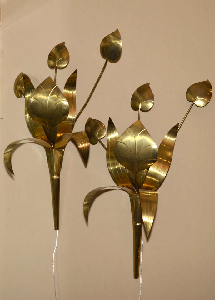 Two 1960s floral appliques in gilded brass, with one light. Wired for European use.