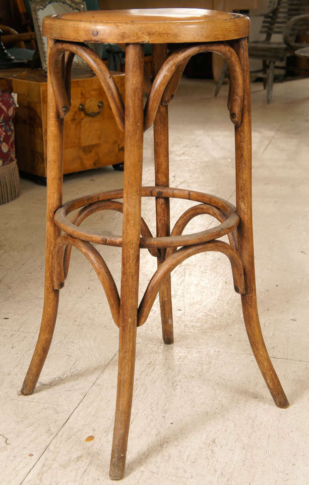 Continental bentwood bar stool with leather upholstered seat.
Possibly Thonet but unsigned.