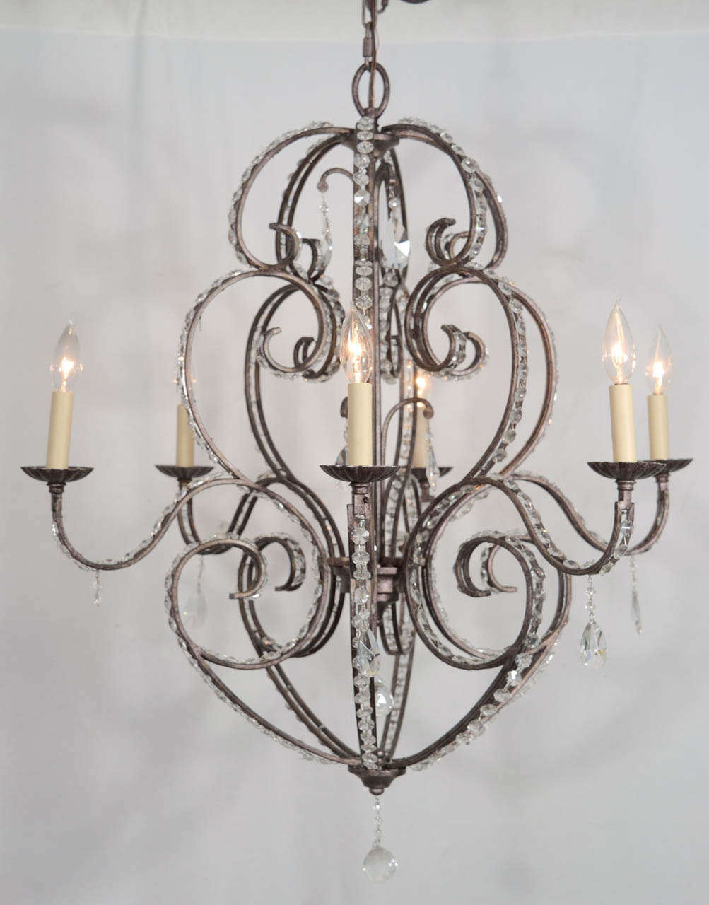 French Provincial Italian Crystal Eight-Light Chandelier with Soft Scrolling Arms For Sale