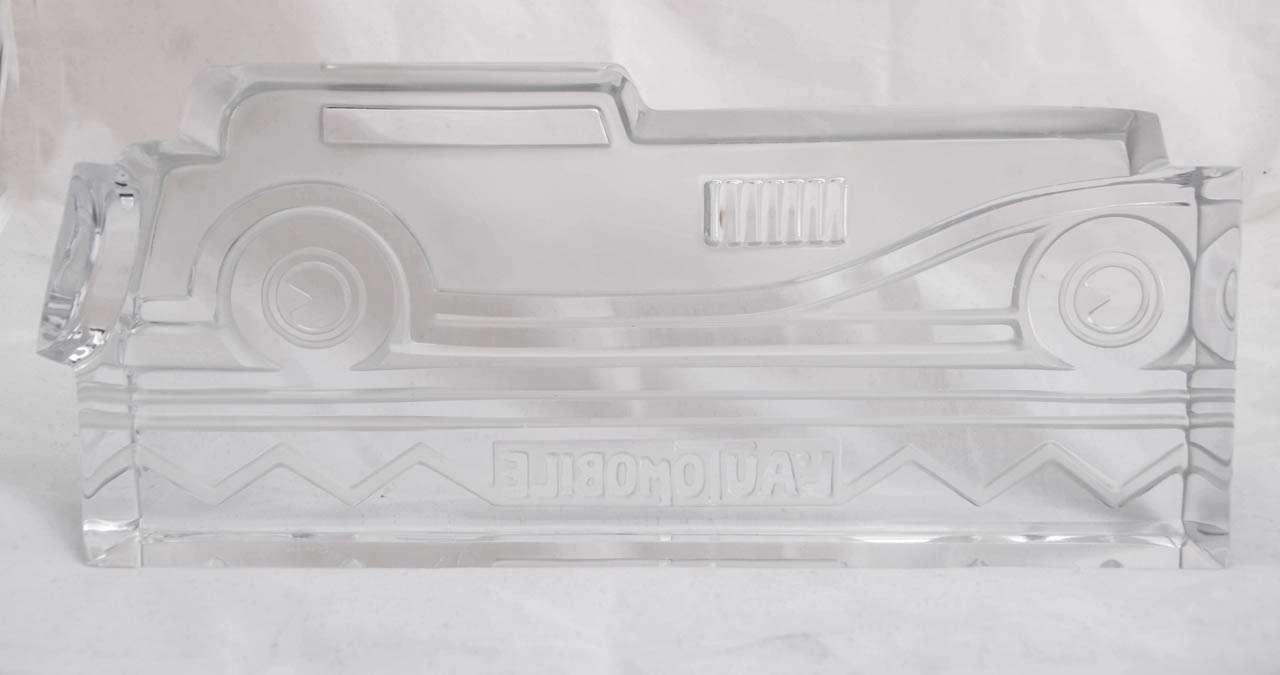 Hard for Photography to do justice to this superb art deco style model of a 1930's automobile. Please contact me for additional images on a black background. This is one of a series of models of automobiles made by the famous French glasshouse of