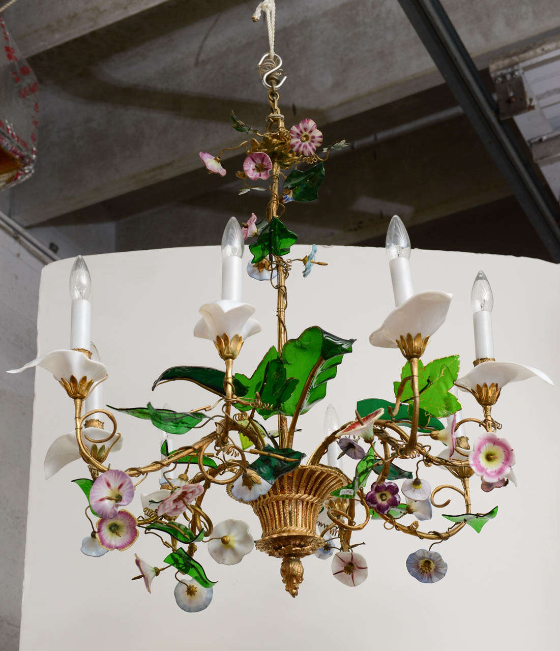 Very rare and elegant chandelier, Charles 'X' colored glass flowers and leaves golden bronze stems. The chandelier is in the French Louis XVs style.

Wired for the US. When illuminated, each flower and leave are brighting and luminescent from the
