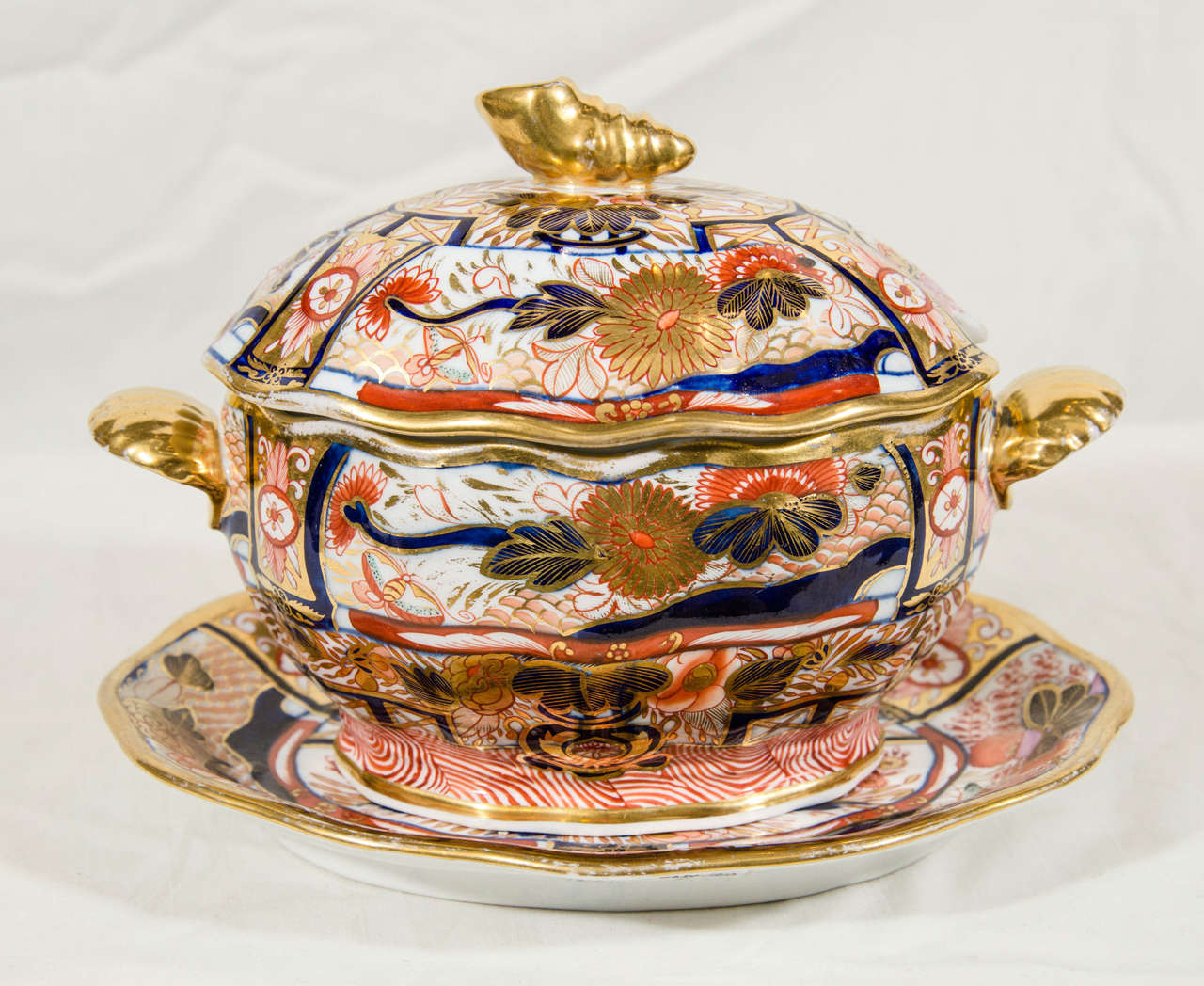 Decorated with cobalt blue and iron red in the richly gilded 