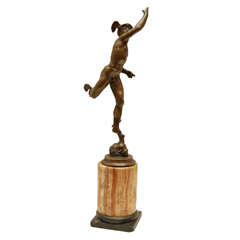 A small bronze of Mercury on marble base