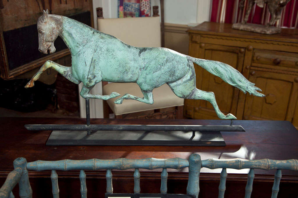 Swell-bodied running horse weathervane, circa 1880. A very fine and large sized “Dexter” race horse weathervane in wonderful verdigris surface. The racehorse Dexter was a Mid-19th century champion morgan trotter known as ‘king of the turf’. Having