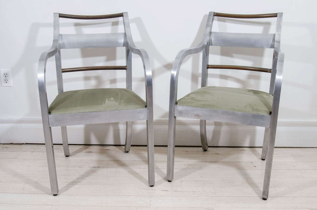 Pair of unusual brushed aluminum and copper arm chairs with upholstered seats.


Available to see in our NYC Showroom 
BK Antiques
306 East 61st St. 2nd fl.
New York, NY 10065