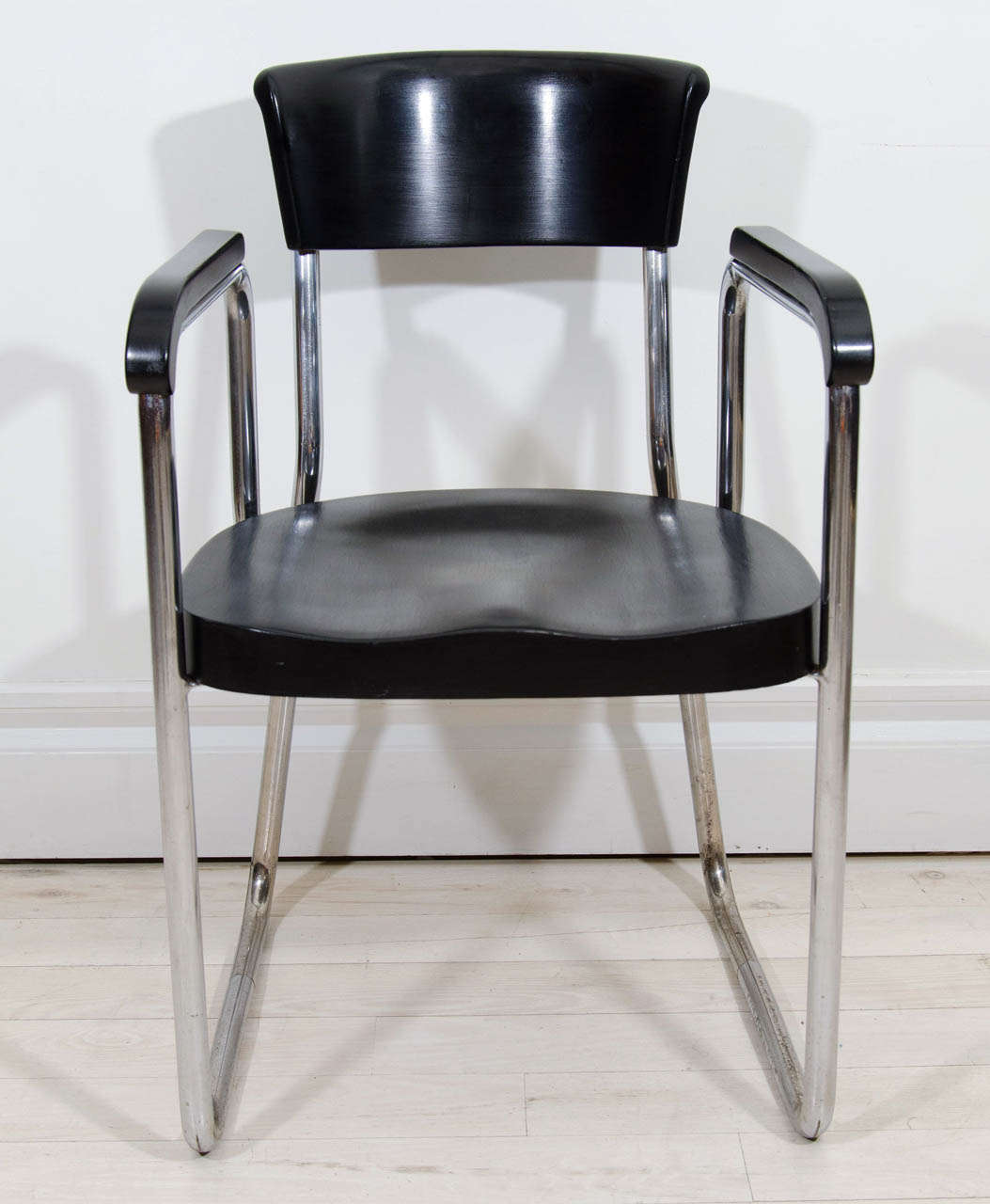 Tubular steel and black lacquer desk chair by Emile Guillot executed by Thonet (with authenticating plaque)