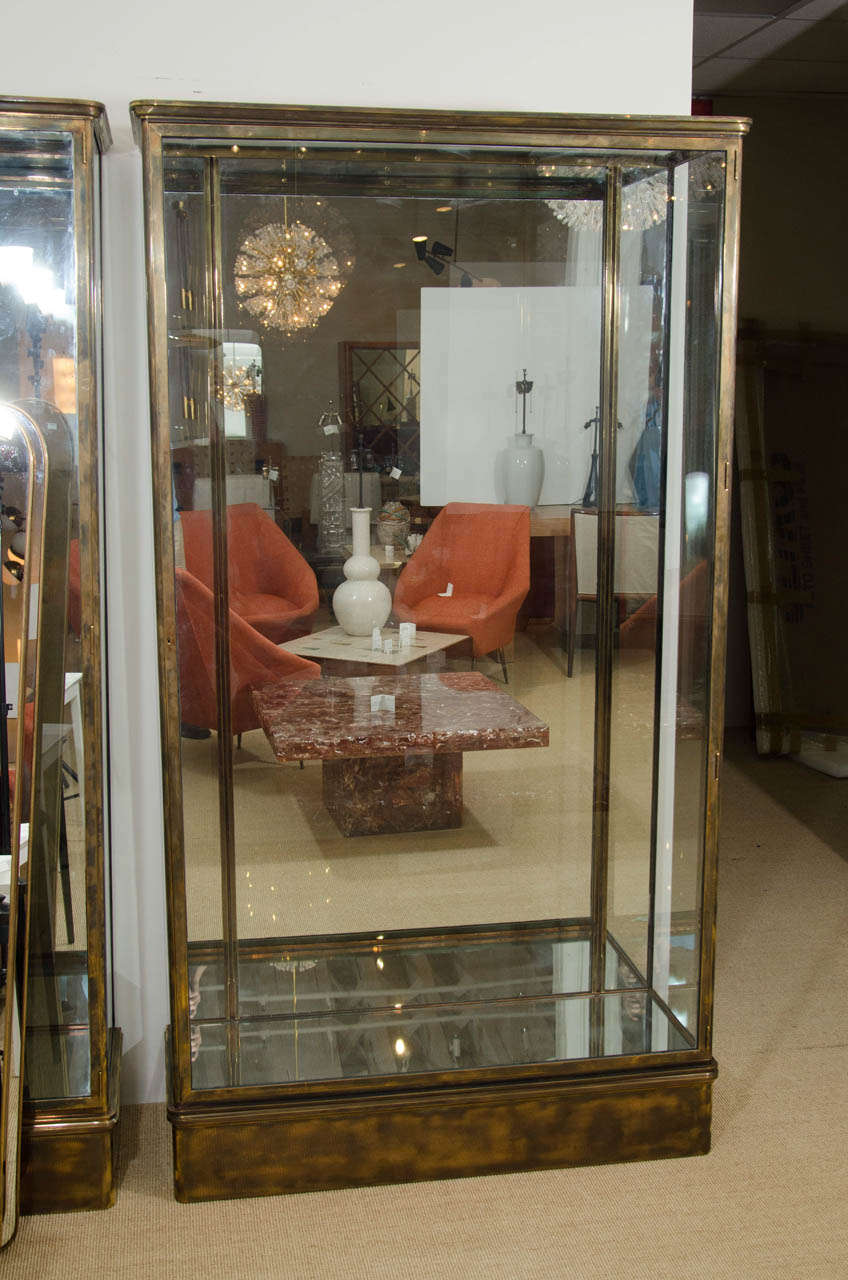 Lanvin glass and bronze vitrines with glass shelves, originally from the 1920s, M. Lanvin Maison, France.