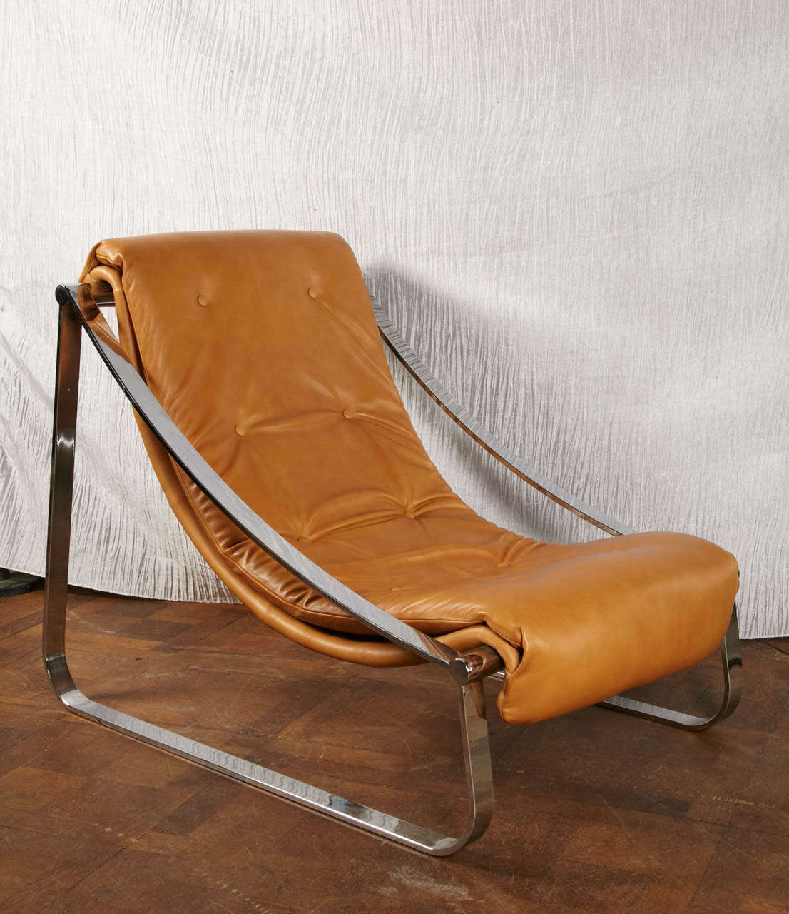 Chrome steel structure. Chrome is very correct, unpitted.
Seating has been redone in light brown colour lamb leather.