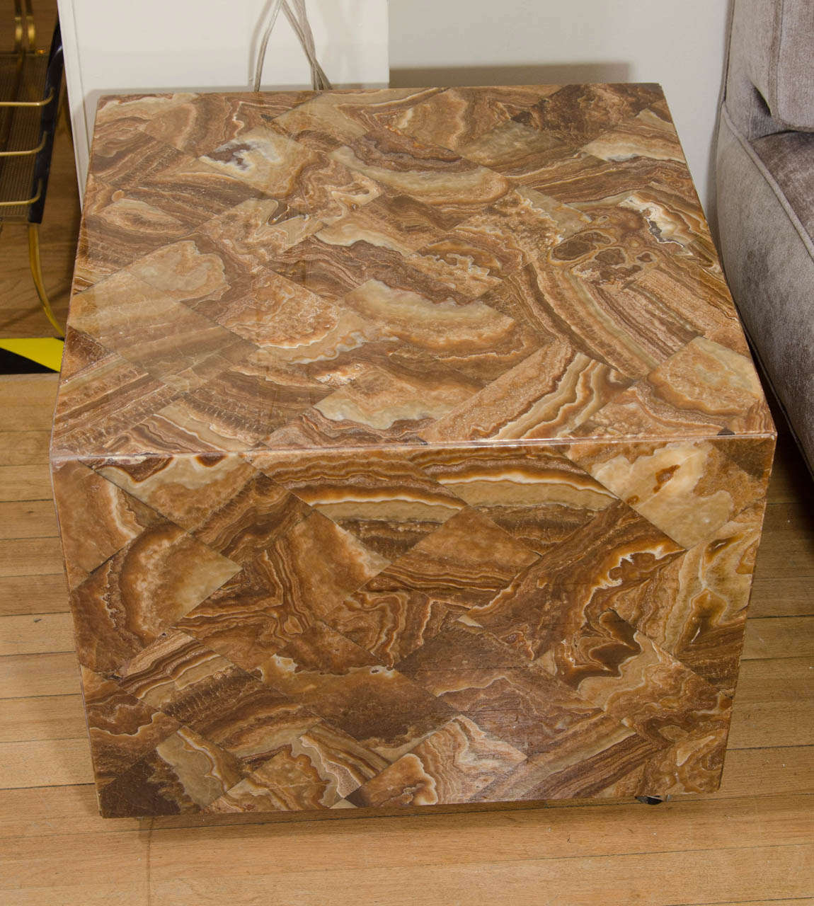 Pair of onyx cube form side tables.