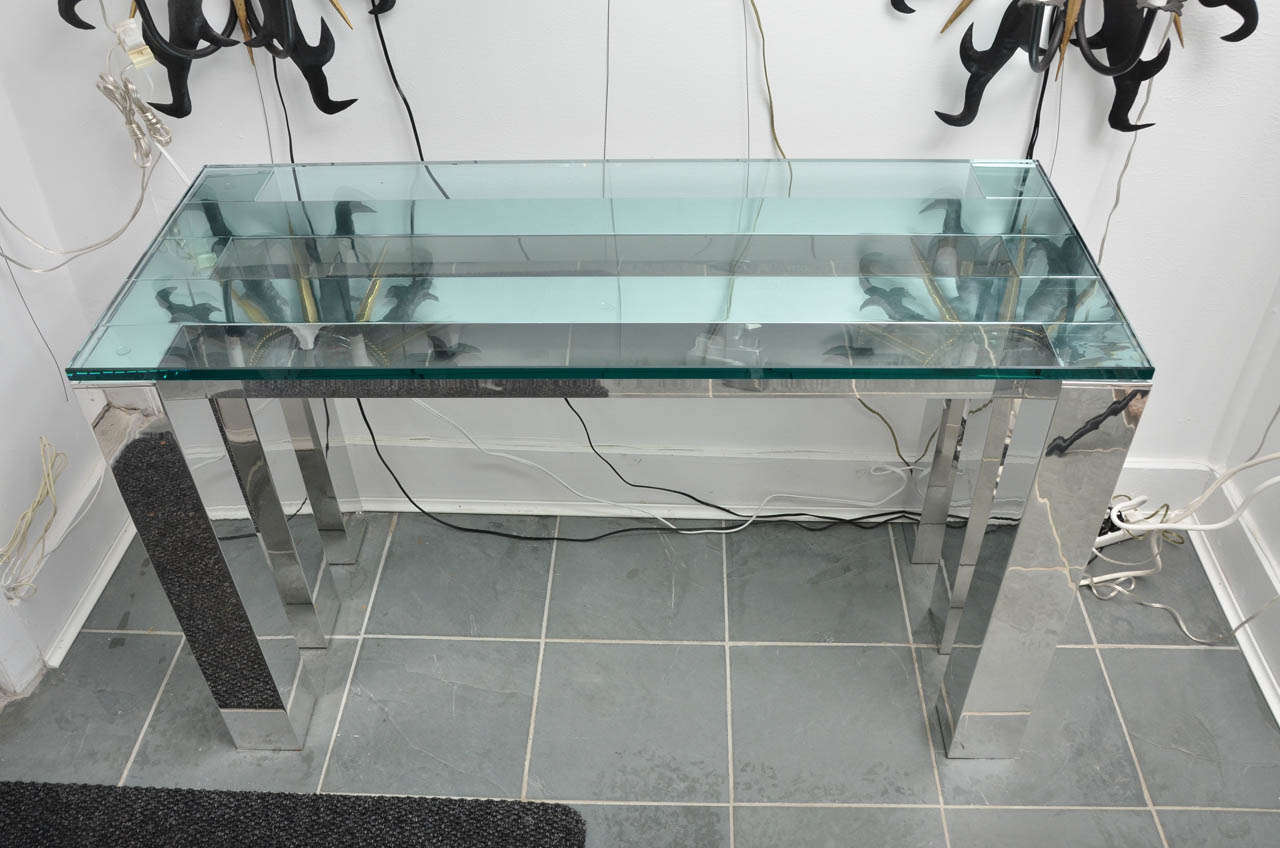 Chromed Aluminum base and glass top console table