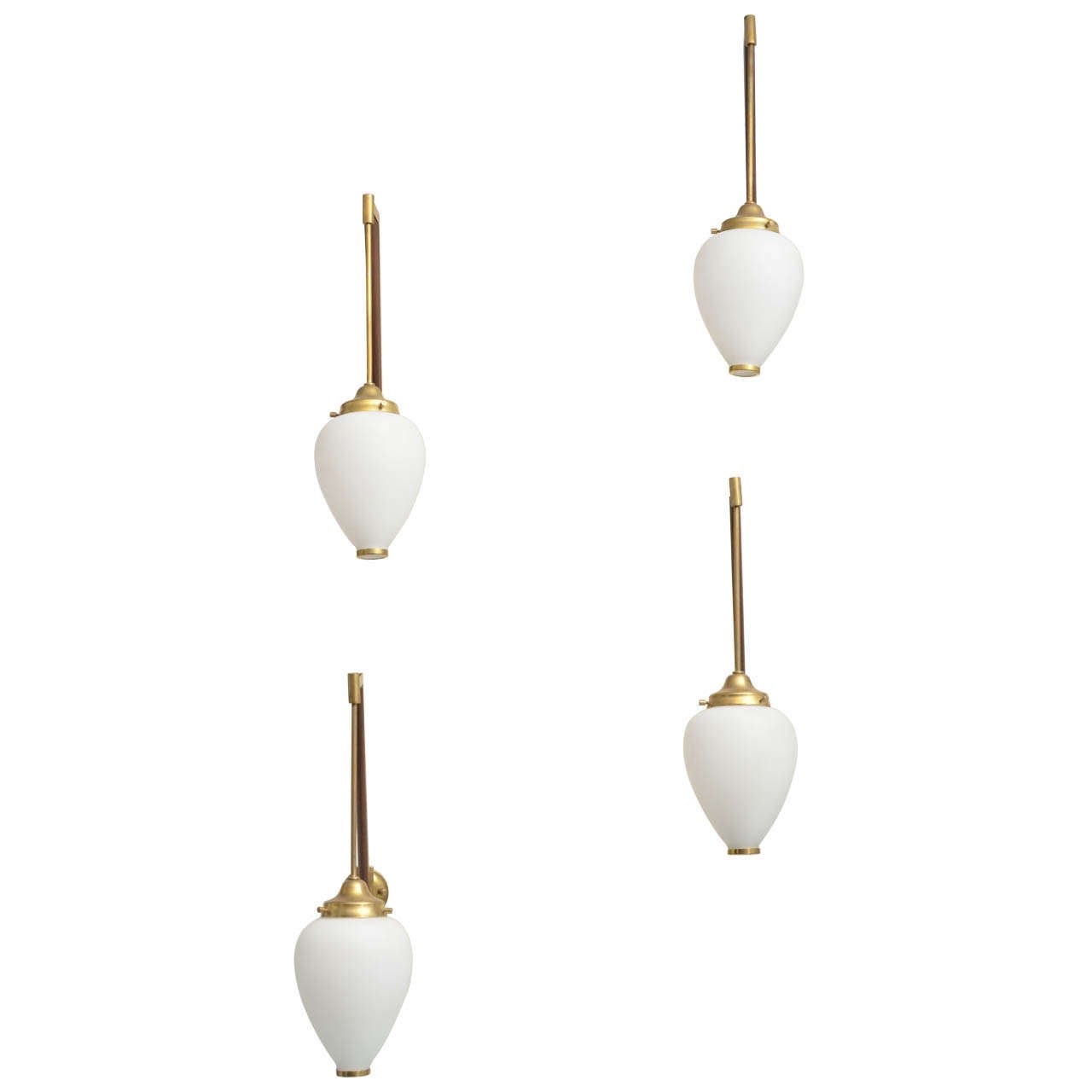 Pair of petite walnut and brass sconces with suspended frosted glass shade, 60 watts max.