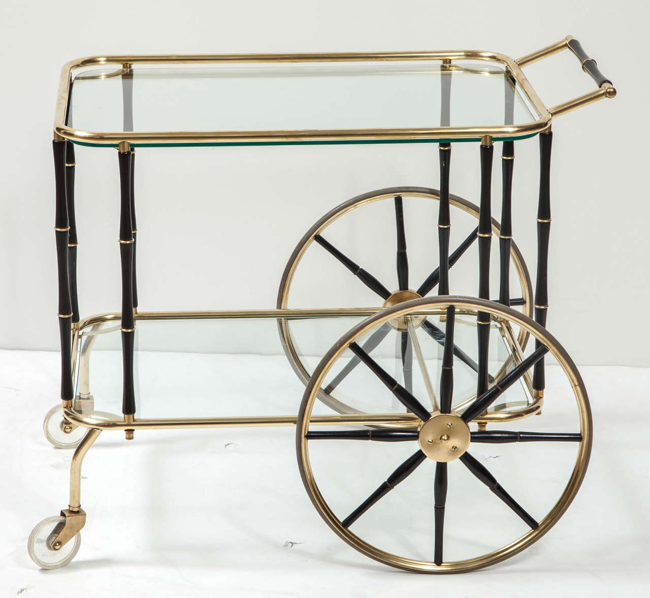 Decorative brass bar cart with black lacquer details, C 1950. Very good condition.