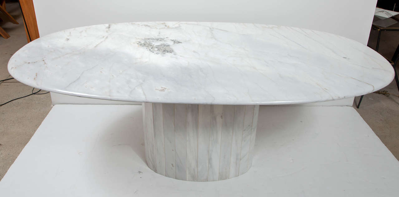 Decorative oval marble table, circa 1960, Italy. The table is polished.