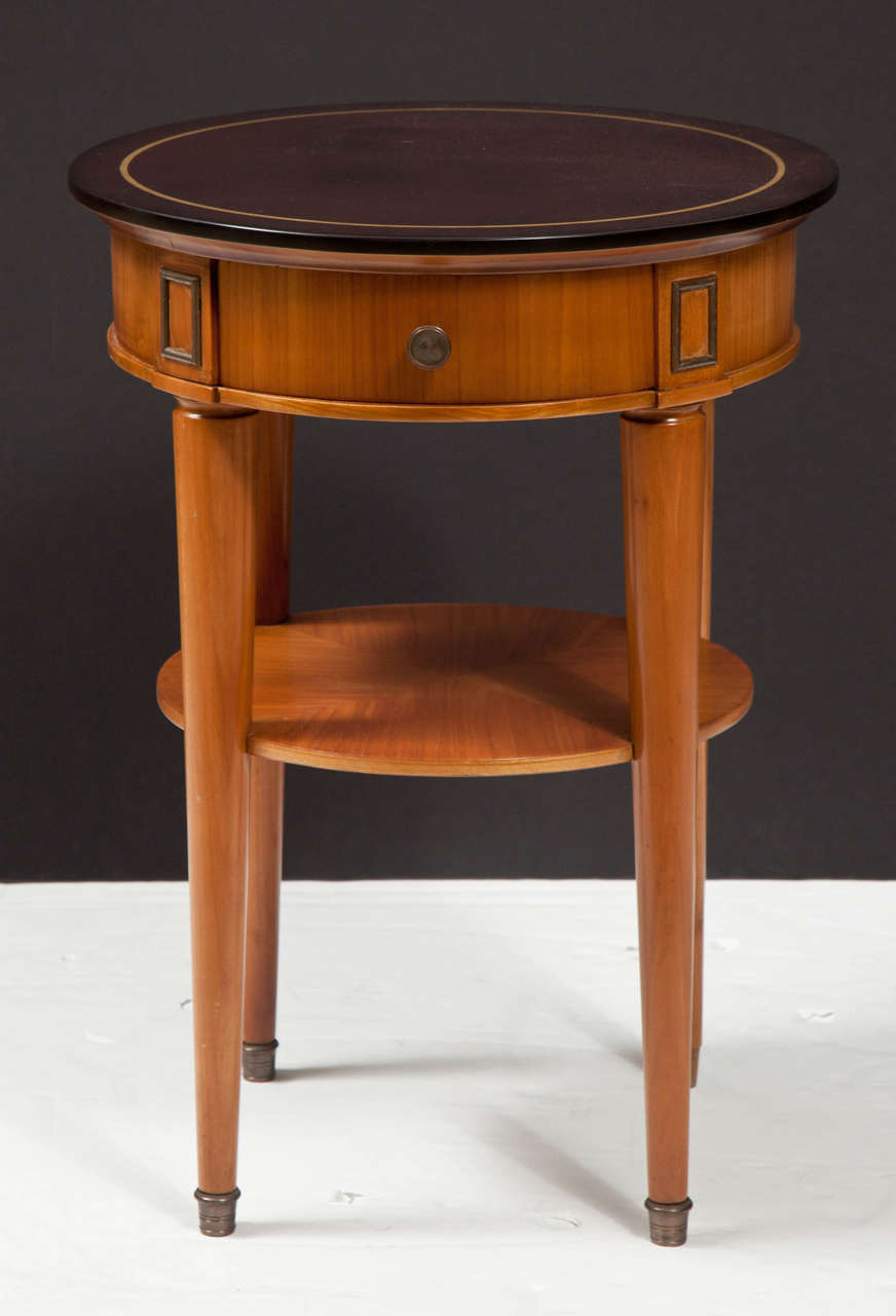 1960s side tables in walnut and lacquered wood.