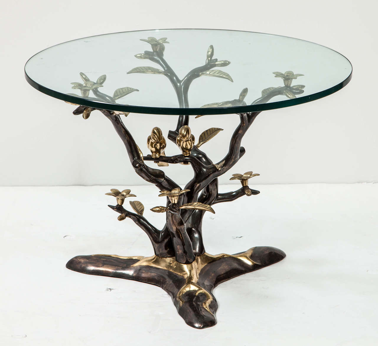 cast bronze single table with flowers and birds