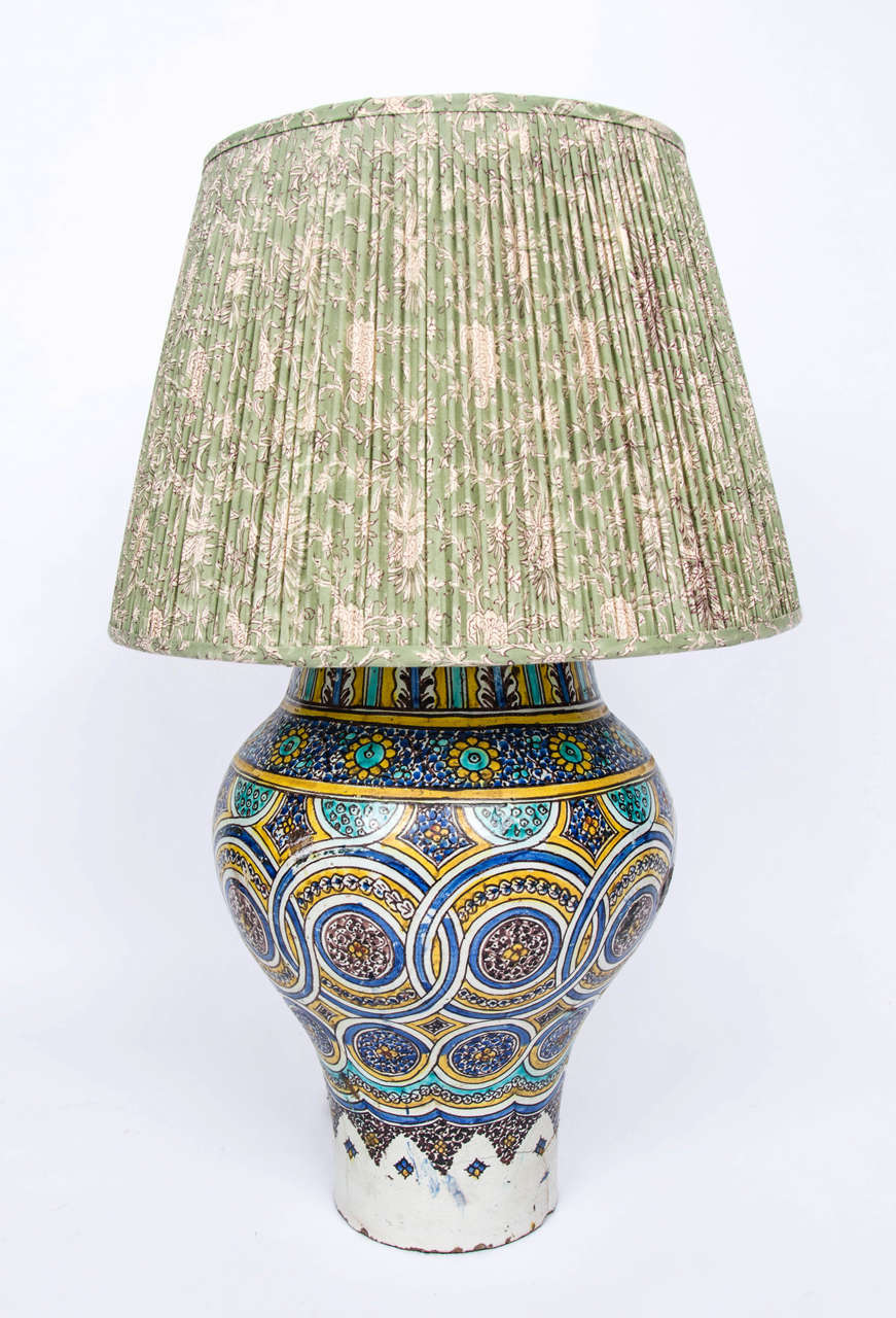 A 19th century Moroccan vase now fitted as a lamp.