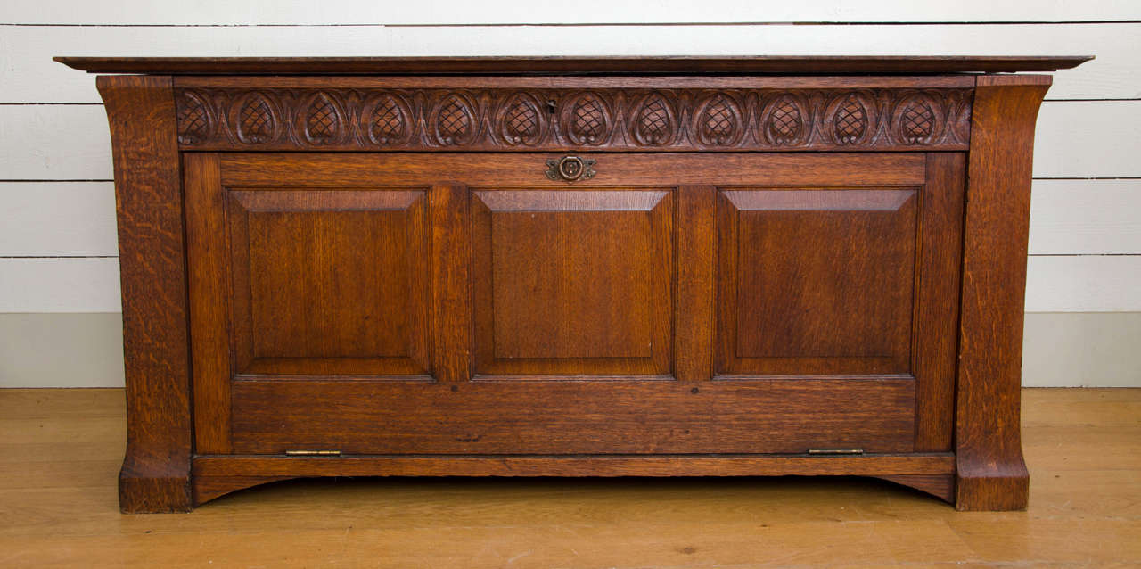 A 19th century Victorian Oak linen chest with hinged top, and drop flap front.