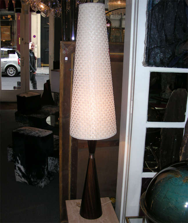 1950s Danish lamp with shaft in rosewood, and original shade in woven wool.