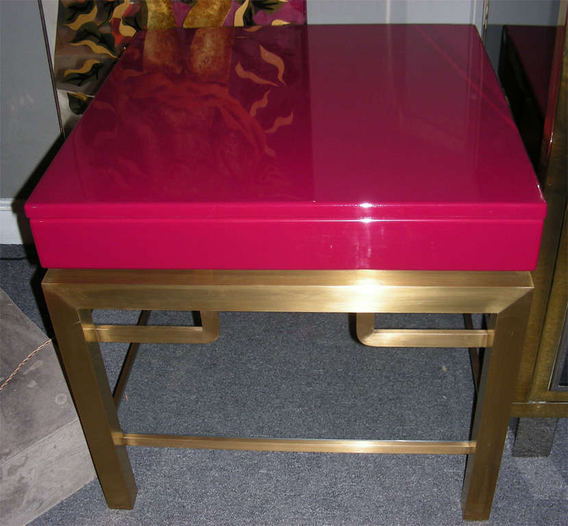 1970s side or coffee table re-lacquered in deep pink color, with satinated brass base and one drawer. By Leleu-Deshays for Maison Charles.