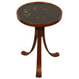 An Edward Wormley Inlaid Constellation Candle Table.