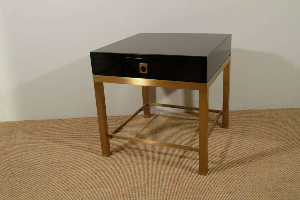 A Pair of Maison Jansen Black Lacquer and Brass End Tables. 3