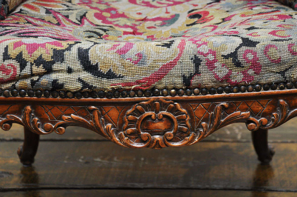 19th Century Pair of Transitional Louis XV Louis XVI Needlepoint Bergères, France, 1880 For Sale