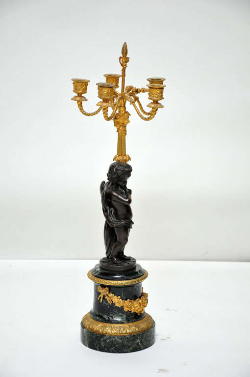 Pair of Patinated Bronze Putti Five-Light Candelabras, France, 1880 In Excellent Condition For Sale In Chicago, IL