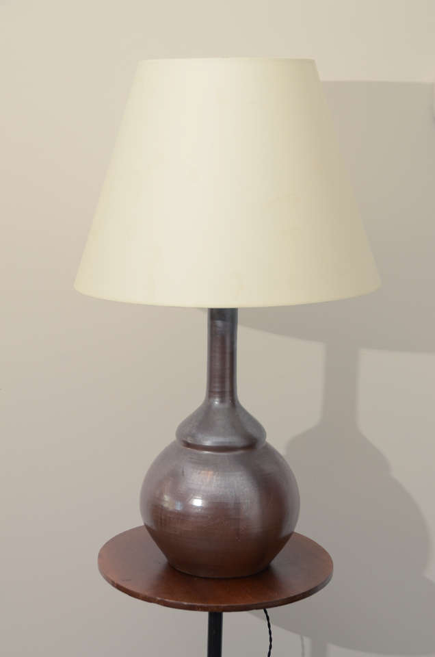 Dark chestnut brown glazed ceramic lamp in the shape of a gourd. Newly rewired with for US with black twisted silk cord, bronze colored fittings. Shade is not included in price.