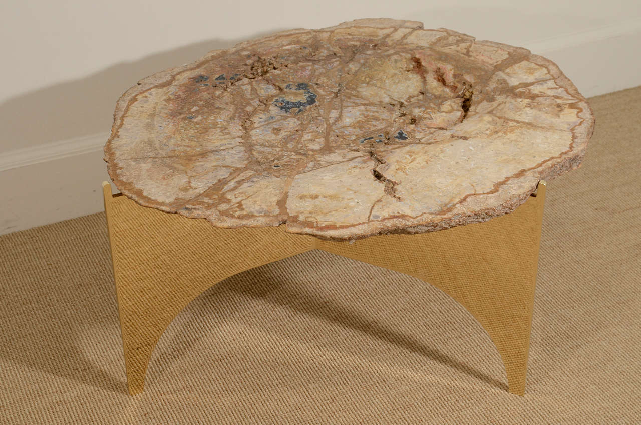 The polished palm wood stone, set into a custom made base.  The base designed by Eric Appel.