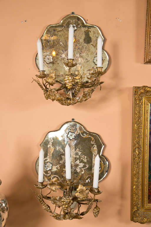 Pair of attractive shell-form mirrored wall sconces/candelabras, decorated with beautiful etched detail, the bottom with gilt-metal leaf-like three-arm candle holders.