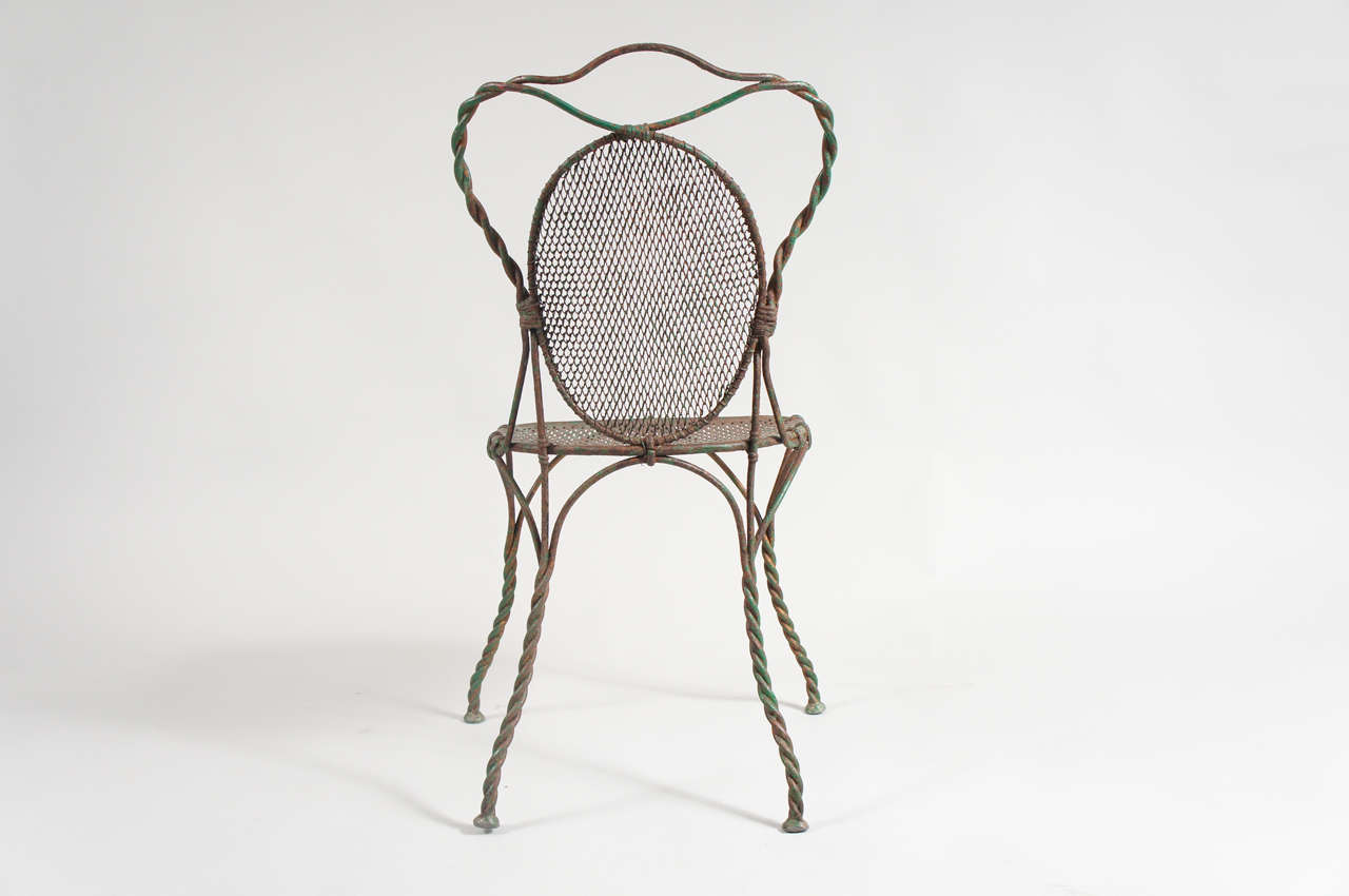 Pair of Green Iron Chairs 1