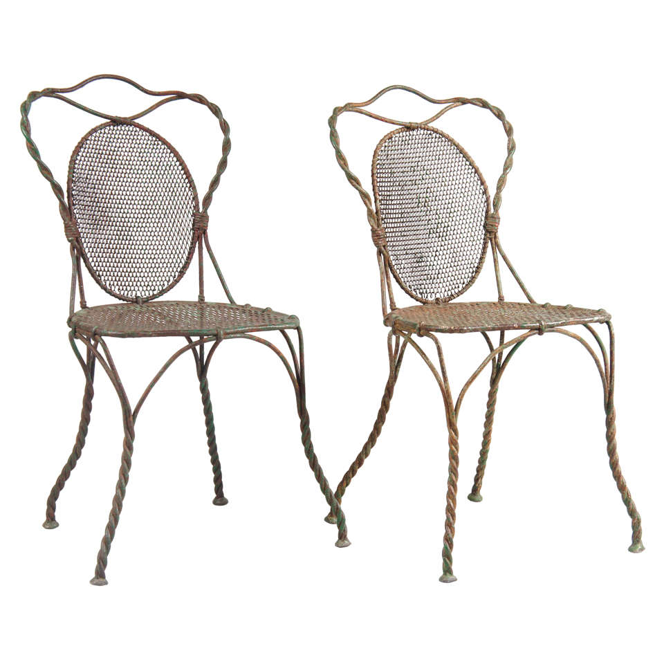 Pair of Green Iron Chairs