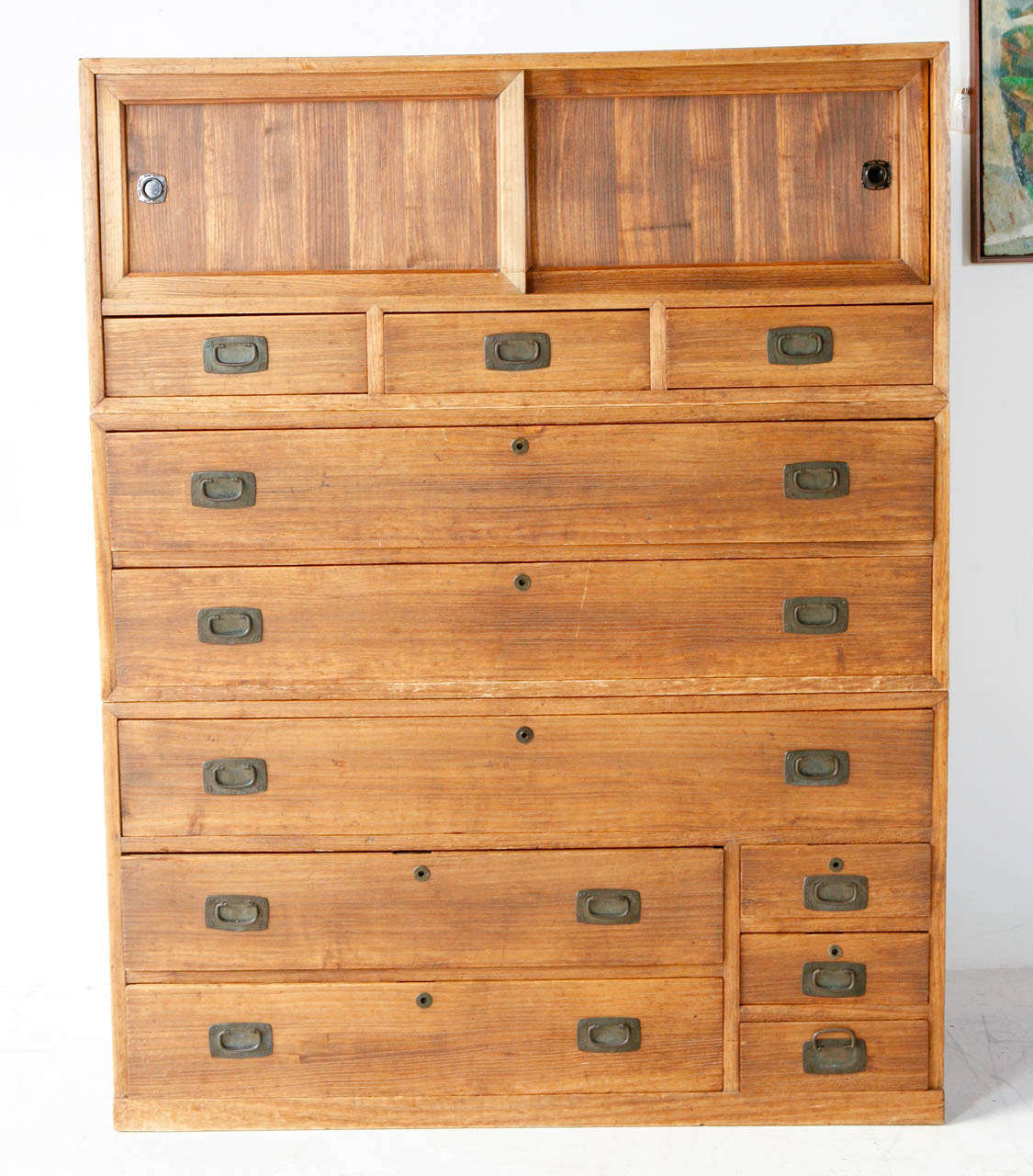 Kiri wood Japanese three piece chest of 11 drawers and sliding cabinet.