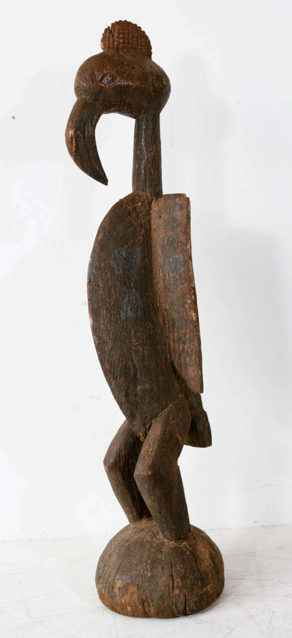 Large carving of an abstract Senufo bird from Sierra Leone's initiation ceremonies.