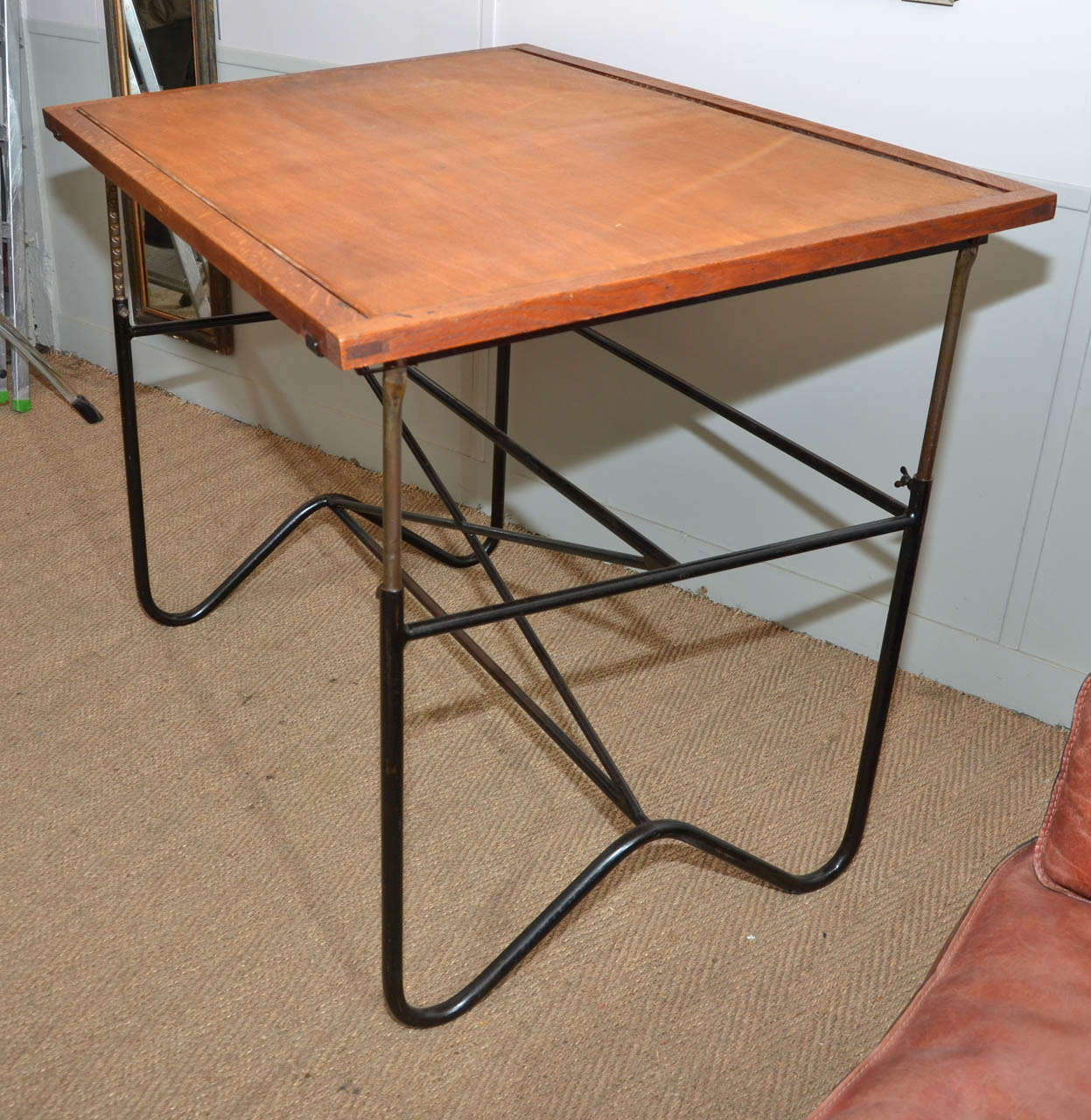 1950's architect table. Black lacquered and patina tube steel structure. Original top with oak frame and beech tree center. Adjustable (up to 51