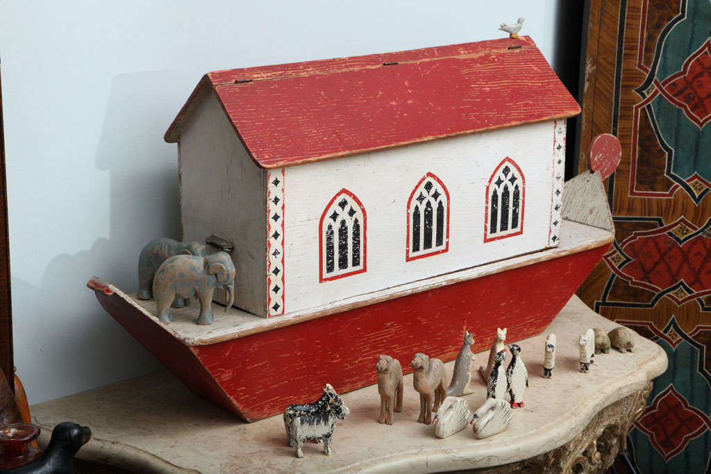 Unusual late 19th or early 20th Century oversize Noah's Ark, the hinged lid over gothic tracery windows, the ark of typical form, complete with Noah, his wife and over 40 animals (in pairs, of course) including many uncommon examples including