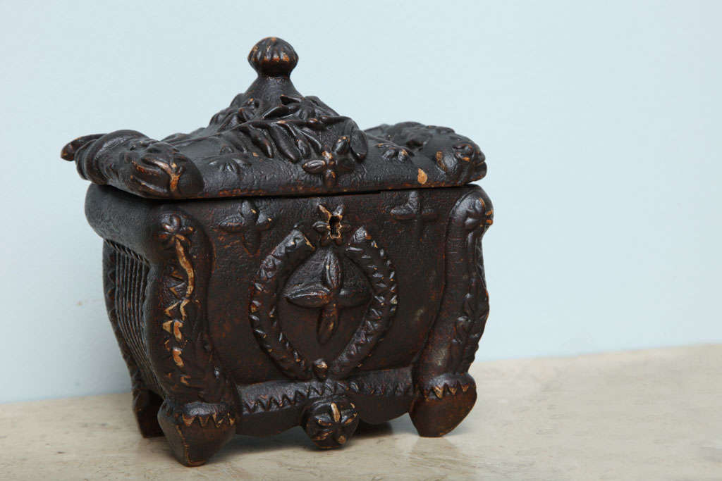 Most unusual early 19th century Scottish carved Folk Art tea caddy, the lid with foliate carving and knob finial, the body taking its design from the more hi style sarcophagus form boxes which were fashionable in Regency society.
