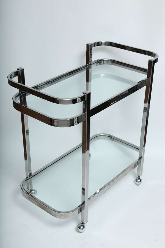A fabulous Milo Baughman Chrome Serving /bar Cart on rolling wheels