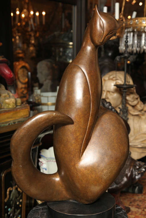 Large modern  bronze sculpture of a cat.