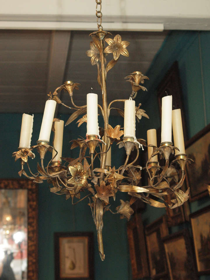 19th century French Louis-Philippe period bronze doré nine light chandelier with floral motif, circa 1840.