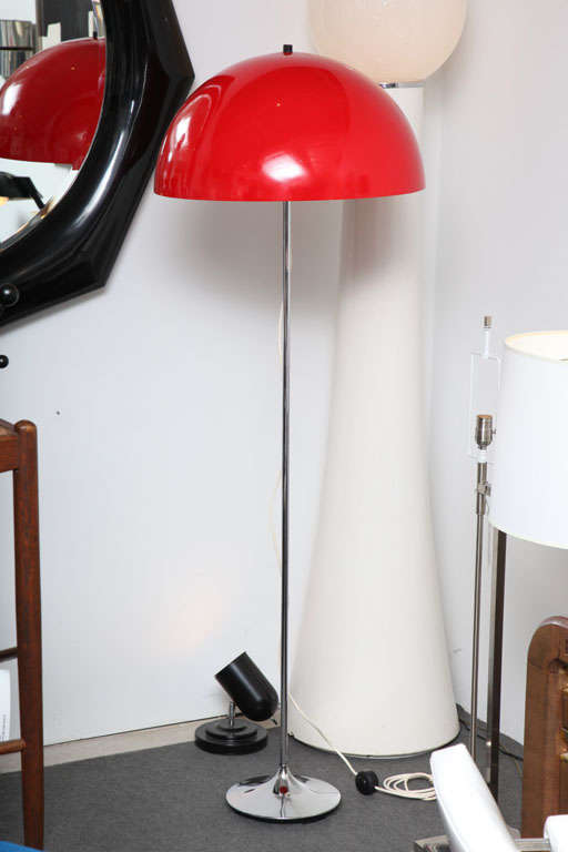 Floor lamp with bright red resin shade and chrome base.  Denmark, circa 1970.

Item may be viewed at the 1stdibs NYDC showroom, 200 Lexington, 10th Floor, New York, NY, 10016.